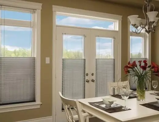 Top-down bottom-up shades in a dining room
